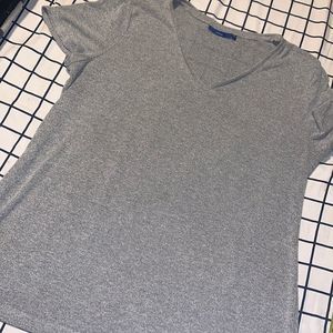 loose grey shirt with sleeves